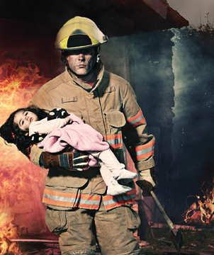 Fire safety for all Ontarians Fireman rescuing a child from a fire.