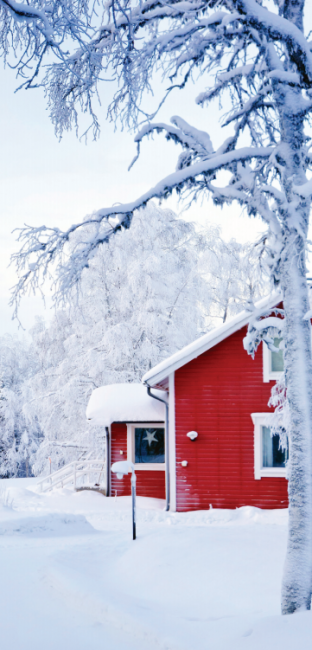 A red house in a snowy landscape. A red house in a snowy landscape.