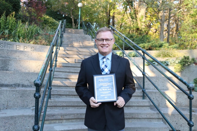 Rex Banks with award Rex Banks with award